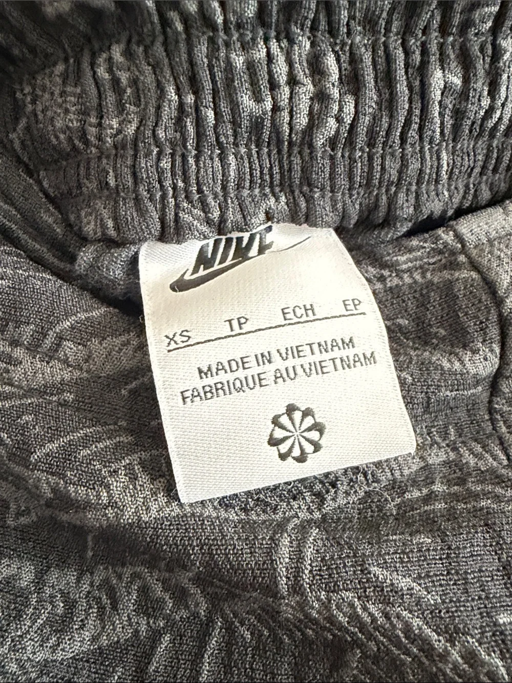 Nike Wide-Leg Floral Jacquard Pants in Charcoal Gray